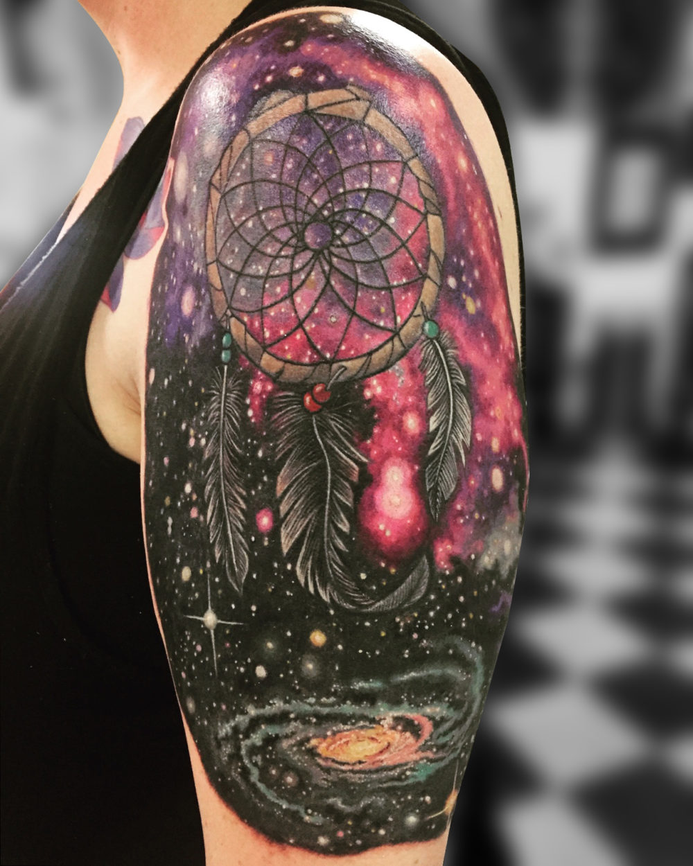 Q Tattoo in Huntington Beach - Karel Beck - the dreamcatcher