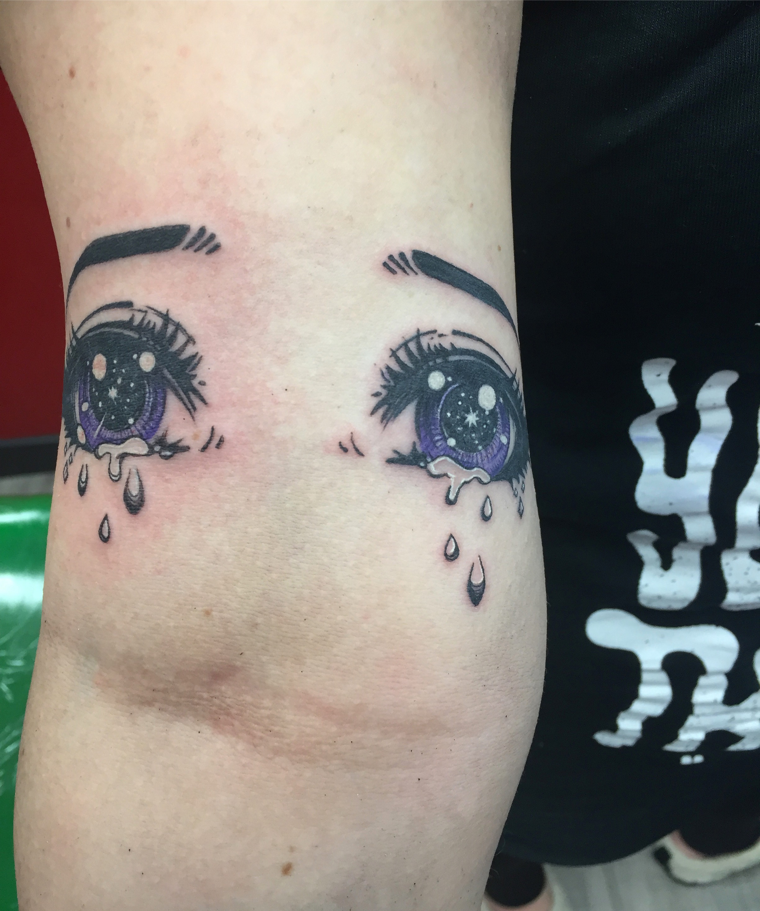 Q Tattoo in Huntington Beach - Karel Beck - Purple Eyes