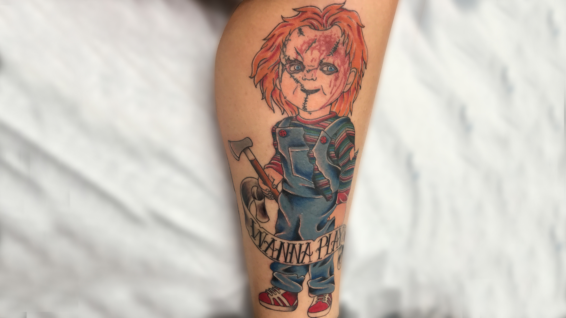 Q Tattoo in Huntington Beach - Sara Delara - Chucky wanna play?